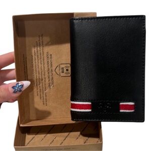 360. Jack Abrahams Black Genuine Leather Wallet with Red and White Accents.